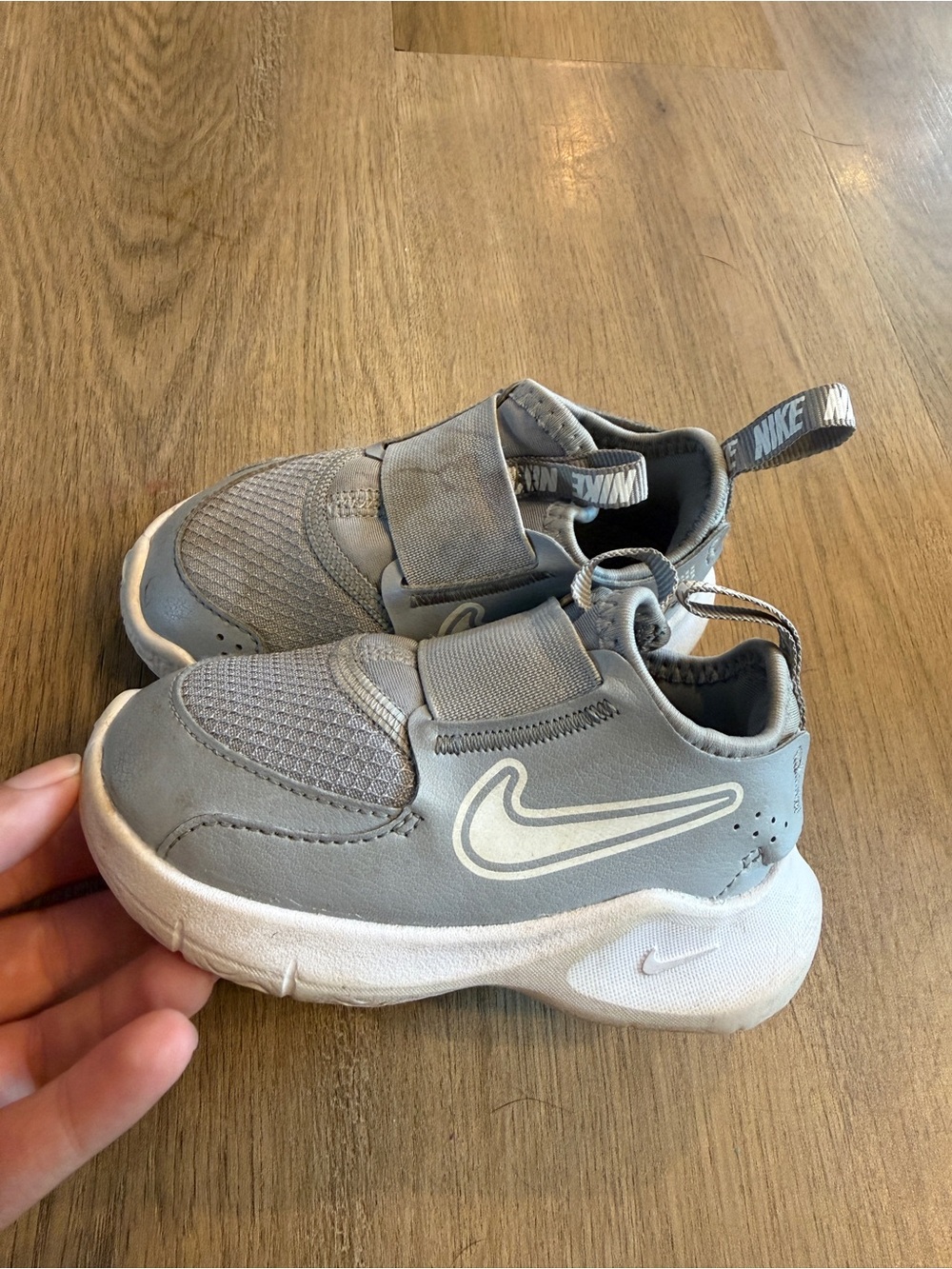Nike Kids Light Grey Slip-On Sneakers with White Swoosh